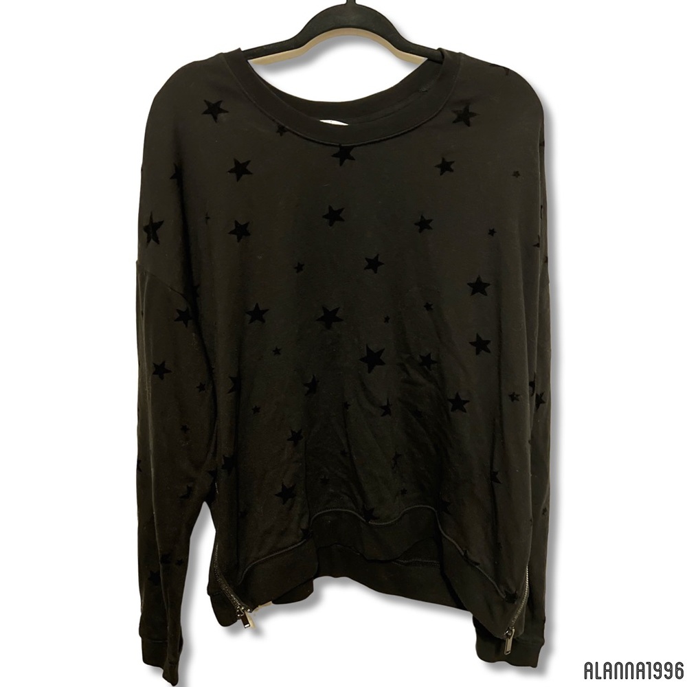 Black crew neck sweater with black velvet stars and zipper sides